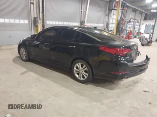 2013 Kia Optima EX z VIN 5XXGN4A77DG257728, wystawiony jako IAAI lot #41735459 z przebiegiem 262 740 mil mil oraz . Historia ofert i sprzedaży dostępna na DreamBid. Obrazek 3.