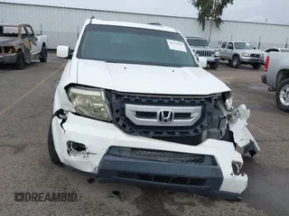 2011 Honda Pilot EX-L z VIN 5FNYF3H75BB027767, wystawiony jako IAAI lot #41770747 z przebiegiem 214 587 mil mil oraz . Historia ofert i sprzedaży dostępna na DreamBid. Obrazek 13.