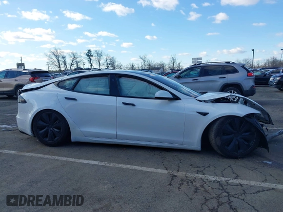2022 Tesla Model S with VIN 5YJSA1E51NF491493, listed as a IAAI auction lot 41570494 with Not Provided miles and . Bid and sale history available at DreamBid. Image 13.