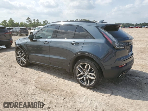 2020 Cadillac XT4 FWD Sport with VIN 1GYFZER40LF012664, listed as a Copart auction lot 54797915 with 59,393 mi miles and Salvage title. Bid and sale history available at DreamBid. Image 2.