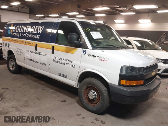 2020 Chevrolet Express Cargo Van with VIN 1GCWGBFB4L1205443, listed as a IAAI auction lot 41612714 with 87,883 mi miles. Bid and sale history available at carsss.com. Image 1.