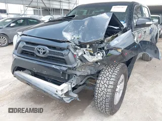 2013 Toyota Tacoma PreRunner with VIN 5TFJU4GNXDX034431, listed as a IAAI auction lot 42201207 with 195,679 mi miles and . Bid and sale history available at DreamBid. Image 6.