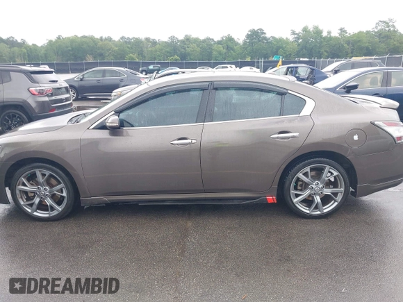 2014 Nissan Maxima S z VIN 1N4AA5AP2EC455230, wystawiony jako IAAI lot #42413381 z przebiegiem 182 766 mil mil oraz . Historia ofert i sprzedaży dostępna na DreamBid. Obrazek 14.
