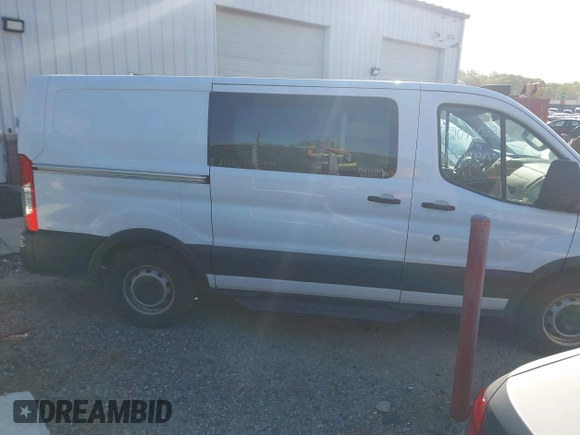2018 Ford Transit with VIN 1FTYE1YM8JKB52082, listed as a IAAI auction lot 42098033 with 243,181 mi miles. Bid and sale history available at carsss.com. Image 13.