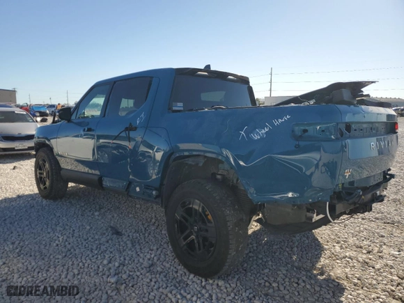 2023 Rivian R1T Adventure with VIN 7FCTGAAA2PN017881, listed as a Copart auction lot 81174594 with 30,903 mi miles and Salvage Title. Bid and sale history available at carsss.com. Image 2.
