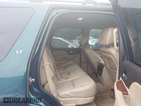 2007 Chevrolet Tahoe LT z VIN 1GNFC13J97R157437, wystawiony jako IAAI lot #41962796 z przebiegiem Nie podano mil oraz . Historia ofert i sprzedaży dostępna na DreamBid. Obrazek 8.