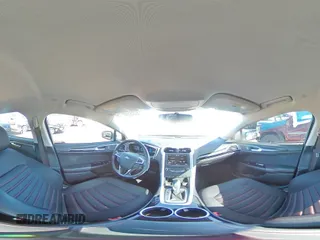 2013 Ford Fusion SE Hybrid z VIN 3FA6P0LU8DR325849, wystawiony jako Copart lot #53520515 z przebiegiem 93 615 mil mil oraz Czysty tytuł • Clean title. Historia ofert i sprzedaży dostępna na DreamBid. Obrazek 14.