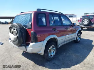 2000 Suzuki Grand Vitara with VIN JS3TE62V5Y4102944, listed as a IAAI auction lot 41782009 with 179,765 mi miles. Bid and sale history available at carsss.com. Image 4.