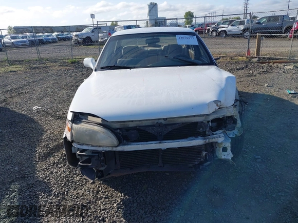 1995 Toyota Camry LE z VIN JT2SK12E5S0332027, wystawiony jako IAAI lot #42078977 z przebiegiem 128 929 mil mil oraz . Historia ofert i sprzedaży dostępna na DreamBid. Obrazek 13.