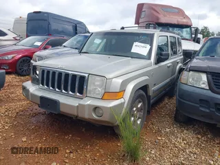 2007 Jeep Commander Sport z VIN 1J8HG48P47C672667, wystawiony jako IAAI lot #40423450 z przebiegiem 230 823 mil mil oraz . Historia ofert i sprzedaży dostępna na DreamBid. Obrazek 2.