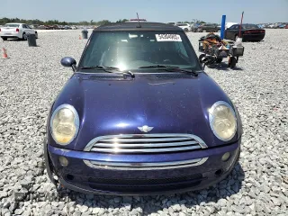 2005 MINI Convertible z VIN WMWRF33435TF61157, wystawiony jako Copart lot #54304905 z przebiegiem Nie podano mil oraz Szkoda całkowita • Salvage title. Historia ofert i sprzedaży dostępna na DreamBid. Obrazek 5.