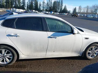 2016 Kia Optima LX with VIN 5XXGT4L31GG034993, listed as a IAAI auction lot 41881231 with 81,888 mi miles. Bid and sale history available at carsss.com. Image 14.