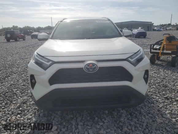 2022 Toyota RAV4 Hybrid XLE Premium with VIN JTMB6RFV4ND535282, listed as a Copart auction lot 61249445 with 82,398 mi miles and Salvage title. Bid and sale history available at DreamBid. Image 5.