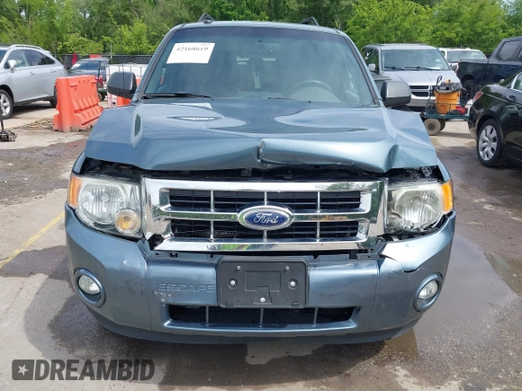 2012 Ford Escape XLT z VIN 1FMCU9DG7CKB91272, wystawiony jako IAAI lot #42168619 z przebiegiem 119 011 mil mil oraz . Historia ofert i sprzedaży dostępna na DreamBid. Obrazek 6.
