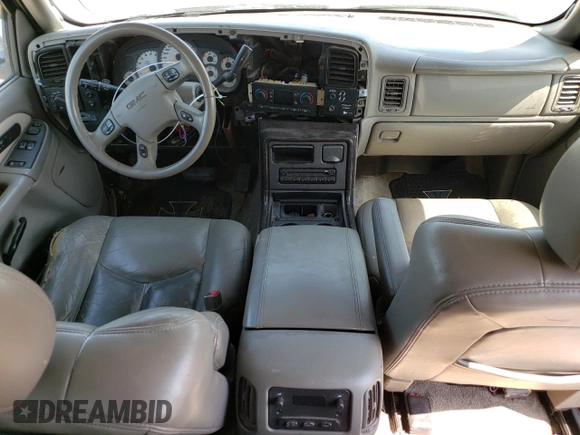 2003 GMC Sierra Denali z VIN 2GTFK69U831158334, wystawiony jako Copart lot #66320714 z przebiegiem Nie podano mil oraz Szkody całkowita. Historia ofert i sprzedaży dostępna na DreamBid. Obrazek 8.