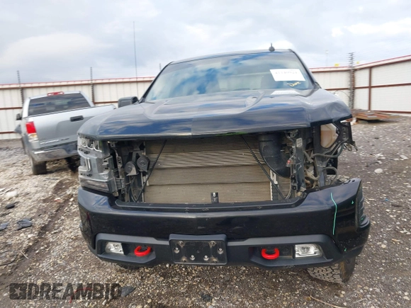2021 Chevrolet Silverado 1500 LT Trail Boss with VIN 1GCPYFEDXMZ130455, listed as a IAAI auction lot 41140924 with 52,293 mi miles and . Bid and sale history available at DreamBid. Image 13.