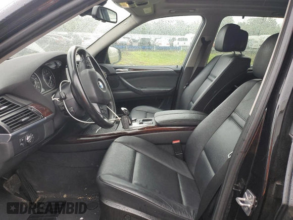 2012 BMW X5 35i with VIN 5UXZV4C57CL765053, listed as a Copart auction lot 59997275 with 157,943 mi miles and Salvage title. Bid and sale history available at DreamBid. Image 7.