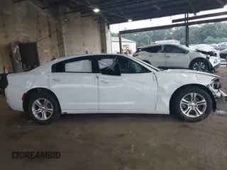 2022 Dodge Charger SXT with VIN 2C3CDXBG6NH235076, listed as a IAAI auction lot 40017954 with 38,444 mi miles and . Bid and sale history available at DreamBid. Image 13.