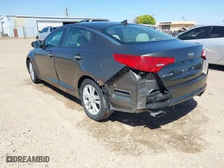 2013 Kia Optima LX with VIN 5XXGM4A74DG093454, listed as a IAAI auction lot 42004990 with 176,667 mi miles. Bid and sale history available at carsss.com. Image 3.