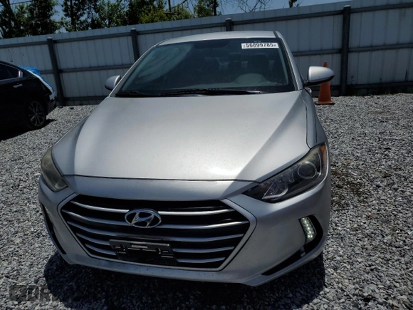 2017 Hyundai Elantra SE z VIN 5NPD84LF0HH063003, wystawiony jako Copart lot #56899785 z przebiegiem 167 502 mil mil oraz Szkoda całkowita • Salvage title. Historia ofert i sprzedaży dostępna na DreamBid. Obrazek 5.