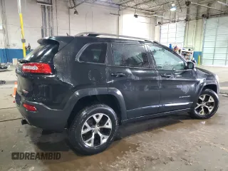 2014 Jeep Cherokee Trailhawk with VIN 1C4PJMBS0EW111606, listed as a Copart auction lot 46680205 with 150,446 mi miles and Clean Title. Bid and sale history available at carsss.com. Image 3.