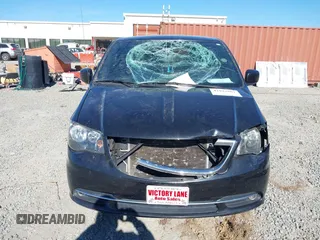 2014 Chrysler Town & Country S with VIN 2C4RC1HGXER225397, listed as a IAAI auction lot 41023867 with 180,093 mi miles and . Bid and sale history available at DreamBid. Image 12.