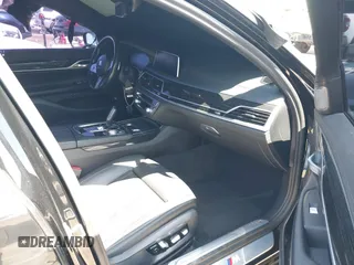 2022 BMW 7 Series 740i with VIN WBA7T2C07NCG88615, listed as a IAAI auction lot 39972481 with 76,169 mi miles. Bid and sale history available at carsss.com. Image 5.