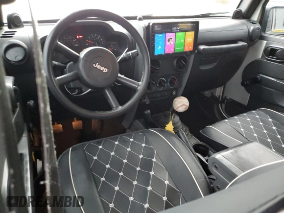 2007 Jeep Wrangler Unlimited X with VIN 1J4GA39177L105582, listed as a Copart auction lot 88912935 with 156,156 mi miles and Salvage Title. Bid and sale history available at DreamBid. Image 8.