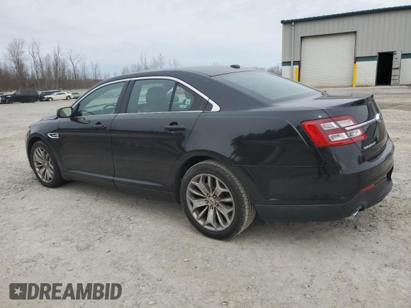 2013 Ford Taurus Limited with VIN 1FAHP2F89DG131731, listed as a Copart auction lot 48609065 with 116,975 mi miles and Salvage title. Bid and sale history available at DreamBid. Image 2.