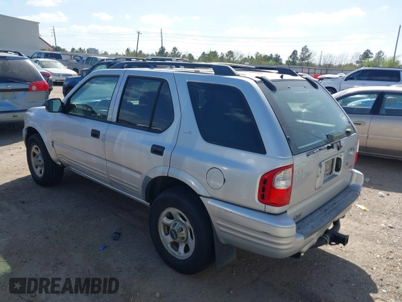 2001 Isuzu Rodeo S with VIN 4S2DM58WX14352481, listed as a IAAI auction lot 41796652 with 162,696 mi miles and . Bid and sale history available at DreamBid. Image 3.