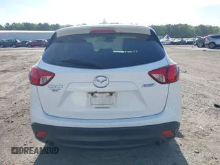2015 Mazda CX-5 Grand Touring with VIN JM3KE2DY5F0498718, listed as a IAAI auction lot 42070000 with 129,327 mi miles. Bid and sale history available at carsss.com. Image 17.