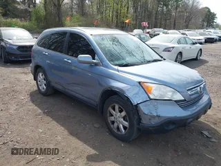 2007 Honda CR-V EX-L z VIN JHLRE38747C057471, wystawiony jako IAAI lot #42126694 z przebiegiem 184 508 mil mil oraz . Historia ofert i sprzedaży dostępna na DreamBid. Obrazek 1.
