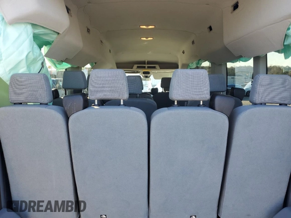 2019 Ford Transit Passenger XL z VIN 1FBAX2CM8KKB18254, wystawiony jako Copart lot #56907515 z przebiegiem 89 829 mil mil oraz Nie do naprawy • Non repairable. Historia ofert i sprzedaży dostępna na DreamBid. Obrazek 11.