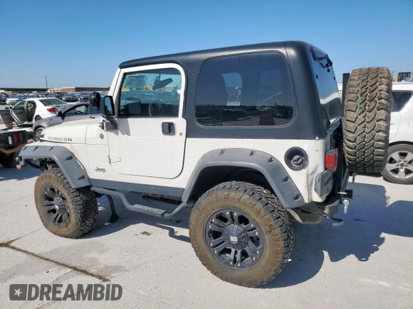 2004 Jeep Wrangler Rubicon z VIN 1J4FA69S34P757352, wystawiony jako Copart lot #52971745 z przebiegiem 139 855 mil mil oraz Szkoda całkowita • Salvage title. Historia ofert i sprzedaży dostępna na DreamBid. Obrazek 2.
