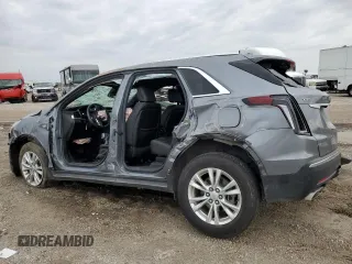 2021 Cadillac XT5 FWD Luxury with VIN 1GYKNAR44MZ192797, listed as a Copart auction lot 87304294 with 0 mi miles and Salvage Title. Bid and sale history available at carsss.com. Image 2.