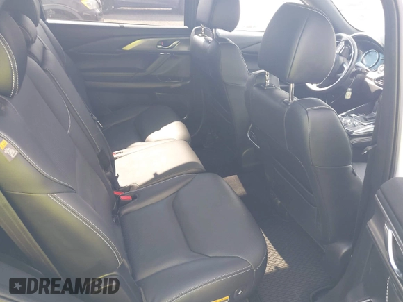 2021 Mazda CX-9 Grand Touring with VIN JM3TCBDY2M0541290, listed as a IAAI auction lot 42216643 with 38,661 mi miles and . Bid and sale history available at DreamBid. Image 8.