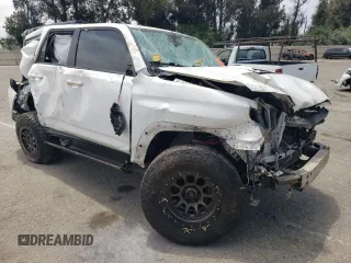 2019 Toyota 4Runner SR5 with VIN JTEBU5JR9K5695720, listed as a Copart auction lot 60170145 with Not provided miles and Salvage title. Bid and sale history available at DreamBid. Image 4.