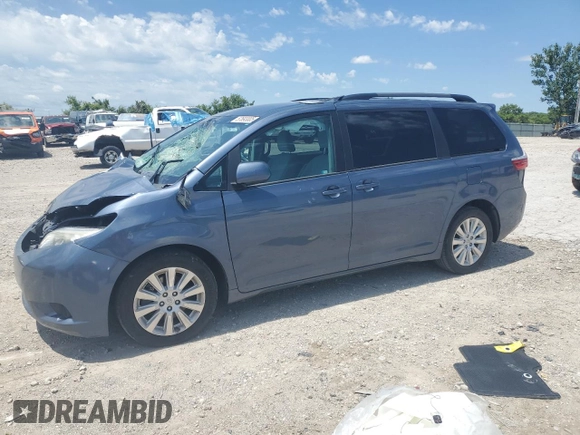 2015 Toyota Sienna LE with VIN 5TDJK3DC4FS107711, listed as a Copart auction lot 57693005 with 141,370 mi miles and Salvage title. Bid and sale history available at DreamBid. Image 1.
