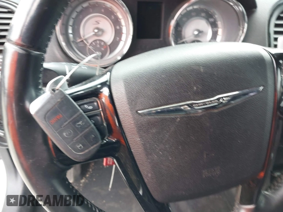 2013 Chrysler 300 with VIN 2C3CCABG5DH711719, listed as a IAAI auction lot 41383018 with 191,863 mi miles. Bid and sale history available at carsss.com. Image 11.