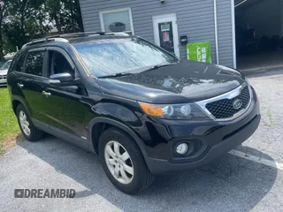 2013 Kia Sorento LX with VIN 5XYKTCA65DG324775, listed as a Copart auction lot 63433705 with 128,031 mi miles and Clean title. Bid and sale history available at DreamBid. Image 1.