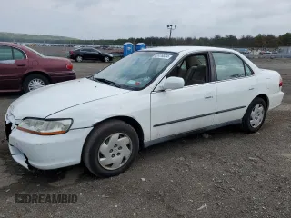2000 Honda Accord LX z VIN 1HGCG1641YA093689, wystawiony jako Copart lot #61476334 z przebiegiem 152 744 mil mil oraz Szkoda całkowita • Salvage title. Historia ofert i sprzedaży dostępna na DreamBid. Obrazek 1.
