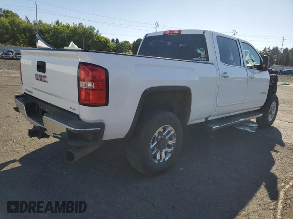 2018 GMC Sierra 2500HD Denali with VIN 1GT12SEY1JF110451, listed as a Copart auction lot 69333874 with 137,760 mi miles and Salvage Title. Bid and sale history available at carsss.com. Image 3.