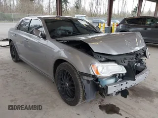 2014 Chrysler 300 with VIN 2C3CCAAG5EH228377, listed as a IAAI auction lot 41911899 with 135,092 mi miles. Bid and sale history available at carsss.com. Image 1.