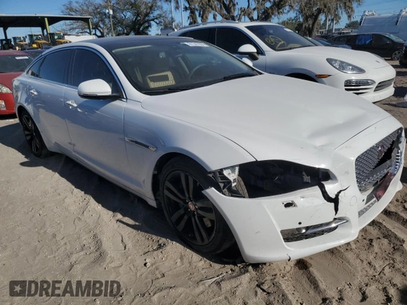 2016 Jaguar XJ Portfolio with VIN SAJWA2G72G8W00103, listed as a Copart auction lot 81347664 with 45,917 mi miles and Salvage title. Bid and sale history available at DreamBid. Image 4.