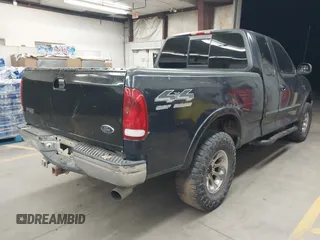 1999 Ford F-150 XL with VIN 1FTRX18L5XKB05347, listed as a IAAI auction lot 41885737 with 250,070 mi miles. Bid and sale history available at carsss.com. Image 4.