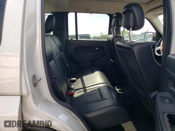 2012 Jeep Liberty Sport Latitude z VIN 1C4PJMAK3CW168087, wystawiony jako Copart lot #55071525 z przebiegiem 108 557 mil mil oraz Szkoda całkowita • Salvage title. Historia ofert i sprzedaży dostępna na DreamBid. Obrazek 11.