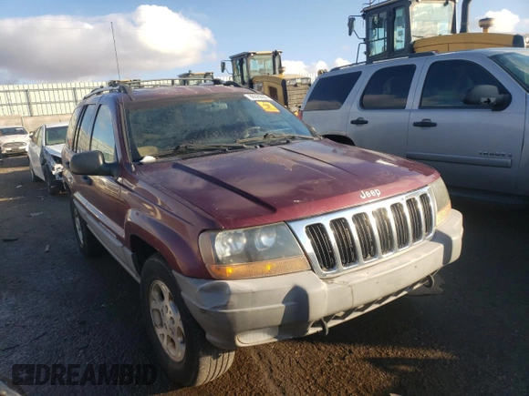 1999 Jeep Grand Cherokee Laredo with VIN 1J4GW58SXXC706962, listed as a Copart auction lot 88325515 with Not provided miles and Clean title. Bid and sale history available at DreamBid. Image 4.