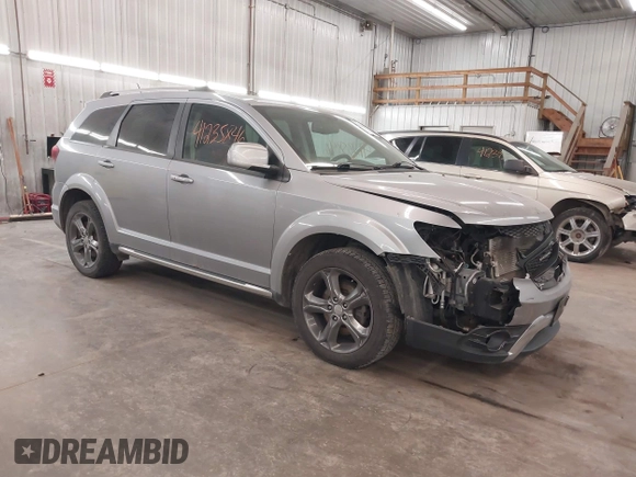 2015 Dodge Journey Crossroad with VIN 3C4PDCGG8FT631064, listed as a IAAI auction lot 41235846 with 127,718 mi miles and . Bid and sale history available at DreamBid. Image 1.