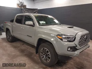 2023 Toyota Tacoma 4WD SR with VIN 3TMCZ5ANXPM607489, listed as a IAAI auction lot 41605018 with 15,229 mi miles. Bid and sale history available at carsss.com. Image 1.