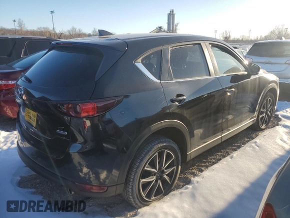 2018 Mazda CX-5 Touring z VIN JM3KFACM9J0300642, wystawiony jako Copart lot #80210854 z przebiegiem 118 309 mil mil oraz Szkoda całkowita • Salvage title. Historia ofert i sprzedaży dostępna na DreamBid. Obrazek 3.